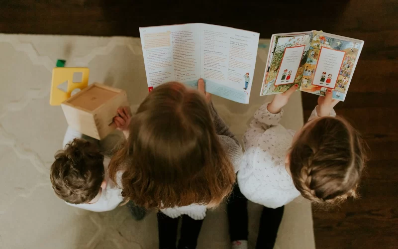 Parent reading with kids