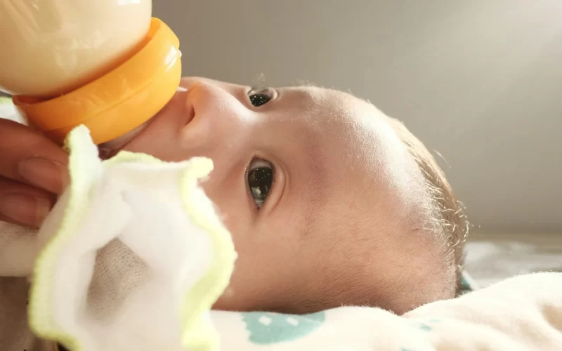 infant feeding from bottle