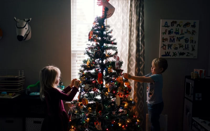 Kids decorating Christmas Tree