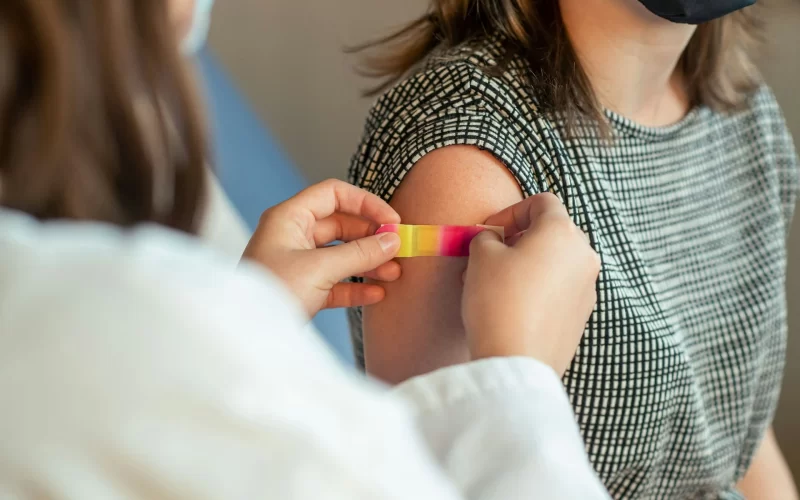 child getting vaccine
